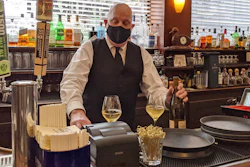 Bartender Dino Keres prepares drinks at Sam’s Grill in San Francisco.