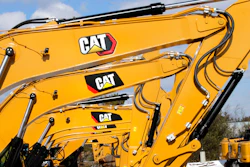 Excavator booms, adorned with the Caterpillar Inc. 'CAT' logo are displayed at the Milton CAT dealership in Londonderry, NH on Feb. 20, 2020.