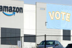 In this March 30 photo, a banner encouraging workers to vote in labor balloting is shown at an Amazon warehouse in Bessemer, Ala.