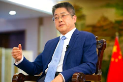Chinese Vice Minister of Foreign Affairs Le Yucheng speaks during an interview with the Associated Press at the Ministry of Foreign Affairs in Beijing, Friday, April 16, 2021. Le spoke to AP on a wide range of issues during an interview on Friday including climate change and US-China relations.