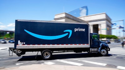 An Amazon truck drives in in Philadelphia on April 30.