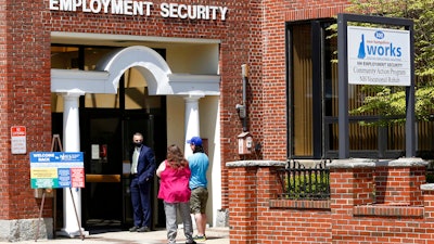 Job seekers outside the New Hampshire Works employment security job center in Manchester, May 10, 2021.