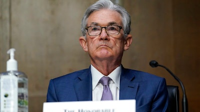 In this Dec. 1, 2020 photo, Chairman of the Federal Reserve Jerome Powell appears before the Senate Banking Committee on Capitol Hill in Washington.