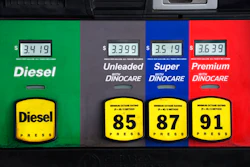 Prices are displayed above the different grades of gasoline available to motorists on May 27 near Cheyenne, Wyo.