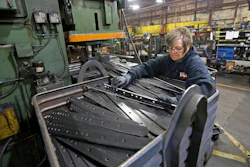 In this April 22 photo, Marie Tibbott sorts product at EIP Manufacturing in Earlville, Iowa.