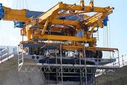 A construction crew work on a new segment of the I-395 interstate highway on May 6 in Miami.