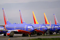 A line of Southwest Air Boeing 737 jets are parked near the company's production plant while being stored at Paine Field Friday, April 23, 2021, in Everett, Wash. Boeing reported its first quarterly profit since 2019 and revenue topped expectations, as the giant aircraft maker tries to dig out from the most difficult stretch in its history. Boeing said Wednesday, July 28, 2021, that it earned $567 million in the second quarter, compared with a $2.4 billion loss a year ago.