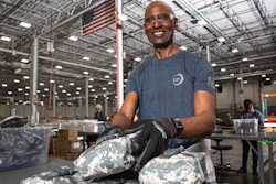 Dennis McDuffie checks first aid kits at LCI in Durham, NC. LCI is a nonprofit organization associated with National Industries for the Blind, the nation’s largest employment resource for people who are blind.