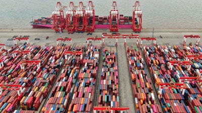 In this July 10, 2021, file photo, the Yangshan container port is seen in an aerial view in Shanghai, China. China has applied to join an 11-nation Asia-Pacific free trade group in an effort to increase its influence over international policies.