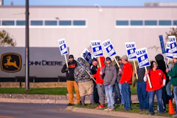 John Deere Drivetrain Operations workers in Waterloo, Iowa, stand on the picket line at the plant as the UAW officially started its strike on Oct. 14.