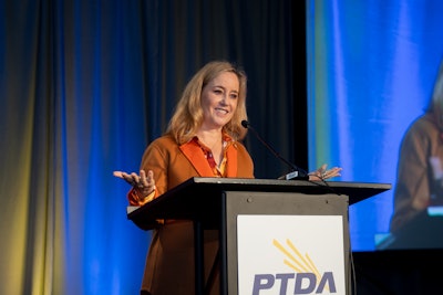 Pamela Kan giving her acceptance speech after receiving the Warren Pike Award at PTDA's 2021 Industry Summit on Oct. 22 in Atlanta, GA.