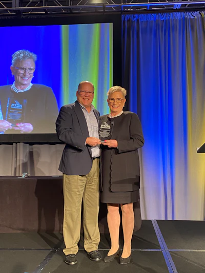 PTDA Foundation President Keith Nowak presents the 2021 Wendy B. McDonald Award to Barbara Ross of Garlock Sealing Technologies during the PTDA 2021 Industry Summit.