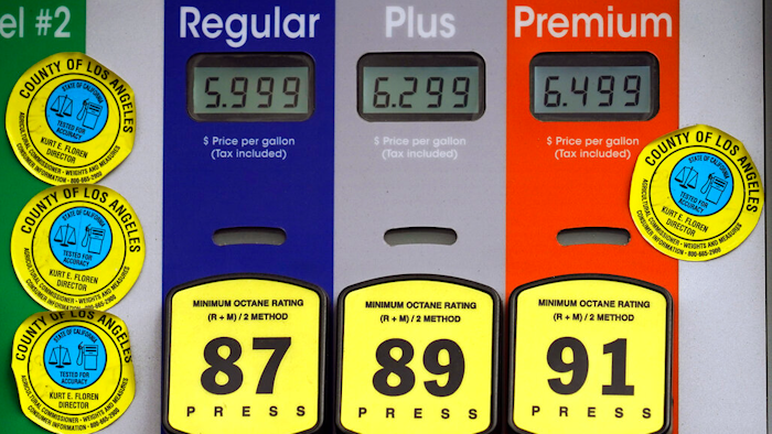 High gas prices are posted at a full service gas station in Beverly Hills, CA on Nov. 7, 2021.
