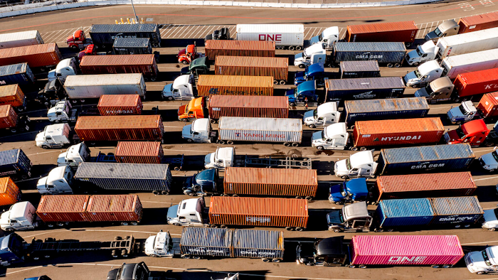 Trucks line up to enter a Port of Oakland shipping terminal on Nov. 10, 2021, in Oakland, CA.