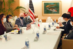 U.S. Commerce Secretary Gina Raimondo, left, talks with Japanese Foreign Minister Yoshimasa Hayashi, right, during their meeting in Tokyo on Nov. 15, 2021.