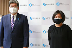 U.S. Trade Representative Katherine Tai, right, poses for a photo with her counterpart Koichi Hagiuda prior to their meeting in Tokyo on Nov. 17, 2021.