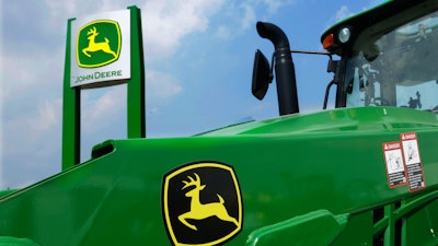 John Deere equipment is on display at the Farm Progress Show on Aug. 31, 2015 in Decatur, Ill. Deere & Co. said on Wednesday, Nov. 24, 2021, its fiscal fourth-quarter profit jumped 69% on strong sales of its agricultural and construction equipment despite a monthlong strike that began near the end of the period.