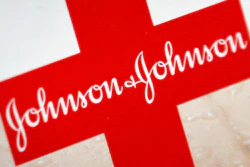 This Oct. 16, 2012 file photo shows the Johnson & Johnson logo on a package of Band-Aids, in St. Petersburg, Fla. Johnson & Johnson is splitting into two companies, separating the division that sells Band-Aids and Listerine, from its medical device and prescription drug business.