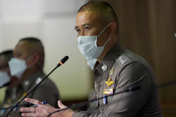 Commissioner of Central Investigation Bureau Jirabhob Bhuridej holds a press conference in Bangkok, Thailand, Wednesday, Nov. 3, 2021. The commissioner announced that they have arrested the head of a company suspected of cheating overseas buyers of medical rubber gloves during the coronavirus pandemic.