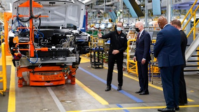 President Joe Biden participates in a tour of the General Motors Factory ZERO electric vehicle assembly plant on Nov. 17, 2021 in Detroit.