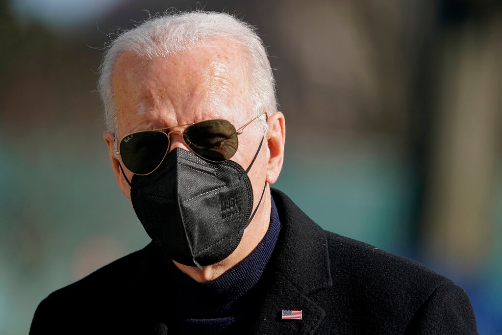 President Joe Biden walks on the South Lawn of the White House after stepping off Marine One, Sunday, Feb. 6, 2022, in Washington. Biden returned to Washington after spending the weekend at his home in Delaware.