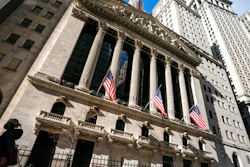 A pedestrian walks past the New York Stock Exchange, Jan. 24, 2022, in New York. Markets are trembling again as fighting intensifies in Ukraine and as Western nations ratchet up steps to further isolate and punish Russia economically for its aggression. The S&P 500 fell 1% in early trading Monday, Feb, 28, 2022 oil prices surged and investors shifted money into safe havens like U.S. government bonds.
