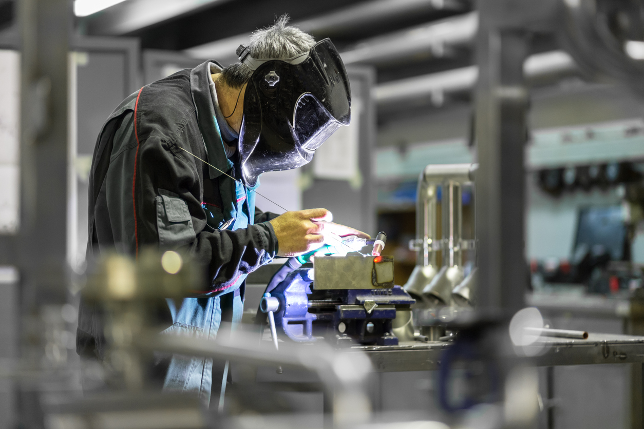 Industrial Worker Welding In Metal Factory 507031528 1258x839 (1)