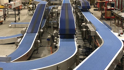Over Under Transpositor Merges 3 Baggers To 2 Case Packers By Multi Conveyor High Res