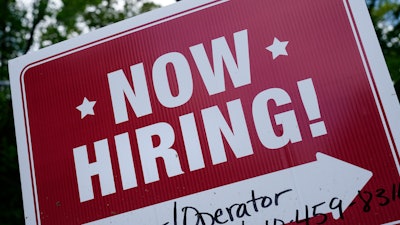 A 'now hiring' sign in Garnet Valley, Pa., May 10, 2021.