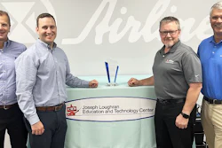From left, Omron's Kenny Heidel and Peter Brouwer award Airline Hydraulics' Michael Schapoehler and Mark Steffens as 2021 Distributor of the Year.