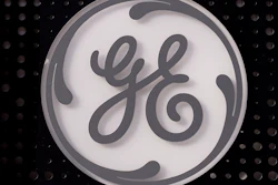 The General Electric logo is displayed on a sign outside their headquarters, Nov. 10, 2021, in Boston. General Electric has decided on the names it will give to the three companies that it plans to divide itself into. GE said Monday, July 18, 2022 that the healthcare business will be named GE Healthcare; the aviation business will be called GE Aerospace; and its energy businesses, including GE Renewable Energy, GE Power, GE Digital, and GE Energy Financial Services, will be named GE Vernova.