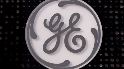 The General Electric logo is displayed on a sign outside their headquarters, Nov. 10, 2021, in Boston. General Electric has decided on the names it will give to the three companies that it plans to divide itself into. GE said Monday, July 18, 2022 that the healthcare business will be named GE Healthcare; the aviation business will be called GE Aerospace; and its energy businesses, including GE Renewable Energy, GE Power, GE Digital, and GE Energy Financial Services, will be named GE Vernova.