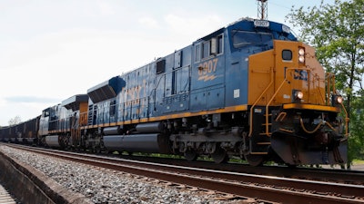 A CSX freight train pulls through McKeesport, Pa., June 2, 2020.