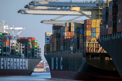 Container ship Ever Far, left, sails past the Port of Savannah, Ga., Sept. 29, 2021.
