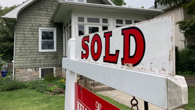 A 'sold' sign posted outside a home in Glenside, Pa., Aug. 4, 2021.