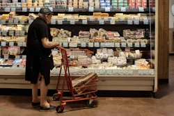 A man shops at a supermarket in New York, July 27, 2022.