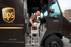 UPS driver Joe Speeler makes a delivery at the Leanon Shops in Mount Lebanon, Pa., Sept. 21, 2021.