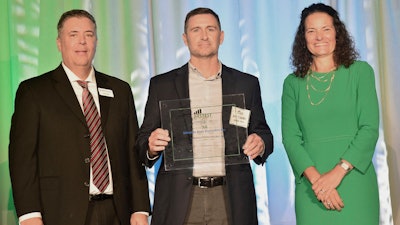 Schaedler Yesco CEO Greg Schaedler accepts an award for ranking among the region's fastest-growing companies.