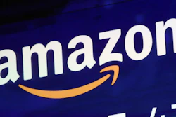 A logo for Amazon is displayed on a screen at the Nasdaq MarketSite, July 27, 2018.