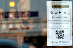 A sign advertises for help at The Goldenrod, York Beach, Maine, June 1, 2022.