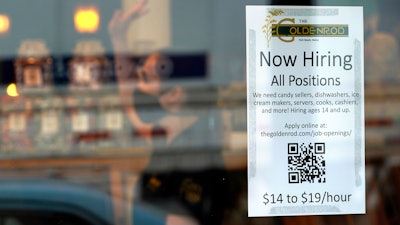 A sign advertises for help at The Goldenrod, York Beach, Maine, June 1, 2022.
