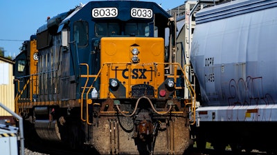 A CSX train engine sits idle on tracks in Philadelphia, Wednesday, Sept. 14, 2022.
