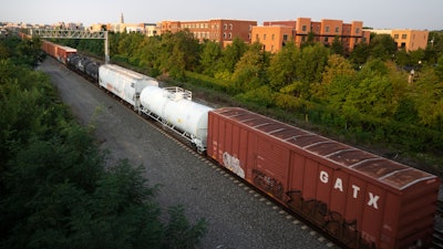 A CSX freight train travels through Alexandria, Va., Sept. 15, 2022.