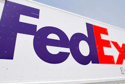 The FedEx logo is seen on a delivery truck, Tuesday, June 21, 2011, in Springfield, Ill. On Monday, Oct. 17, 2022, a federal judge dismissed FedEx from a lawsuit filed by relatives of five of the eight people who were fatally shot last year at an Indianapolis warehouse by a former employee of the shipping giant.