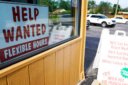 A help wanted sign is displayed in Deerfield, Ill., Sept. 21, 2022.