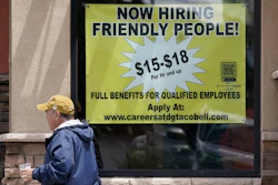 Starting wages advertised at a Taco Bell in Sacramento, Calif., May 9, 2022.