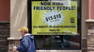 Starting wages advertised at a Taco Bell in Sacramento, Calif., May 9, 2022.