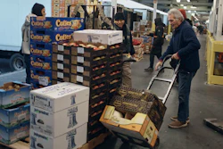 People shop for fruits and vegetables at S. Katzman Produce, Hunts Point Produce Market, the Bronx, Nov. 22, 2022.