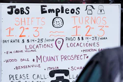 A hiring sign displayed at a job agency in Mount Prospect, Ill., Jan. 3, 2023.