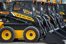 New Holland earth moving and construction equipment on a lot at the Highway Equipment Company in Zelienople, Pa., March 28, 2014.